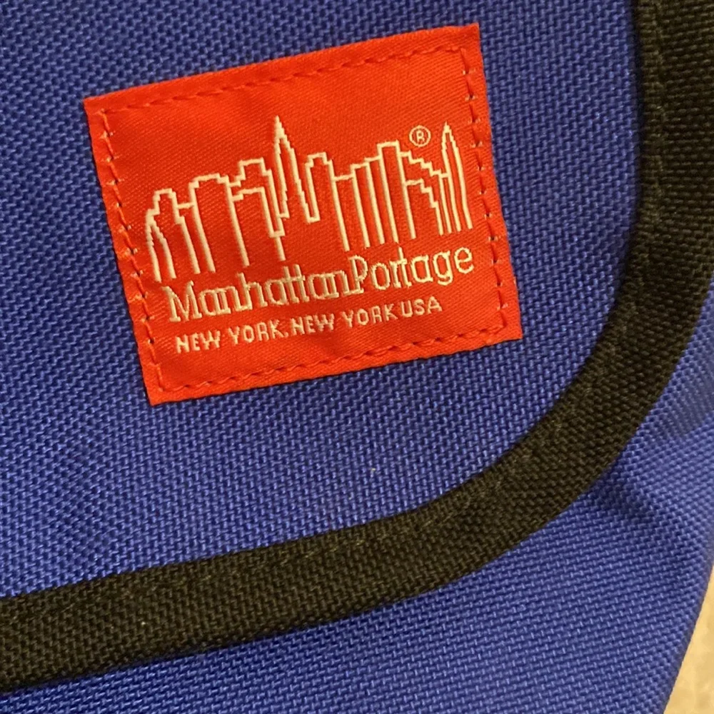 MANHATTAN PORTAGE Blue Shoulder Bag. New. No tags